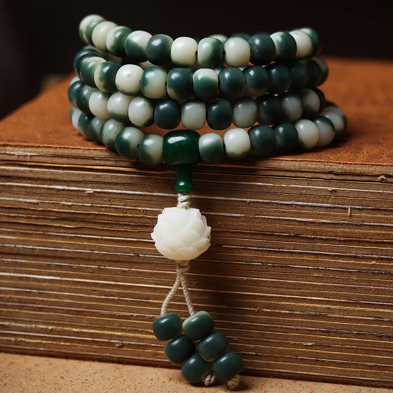Lotus White Jade Bodhi Beads Bracelet featuring 8 × 10mm floating flowers landscape design in natural bodhi root material for unisex ethnic style wristwear with spiritual and fashion elements