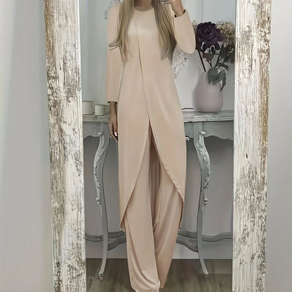Casual black polyester two-piece lounge set with long sleeves and loose fit trousers on a hanger.