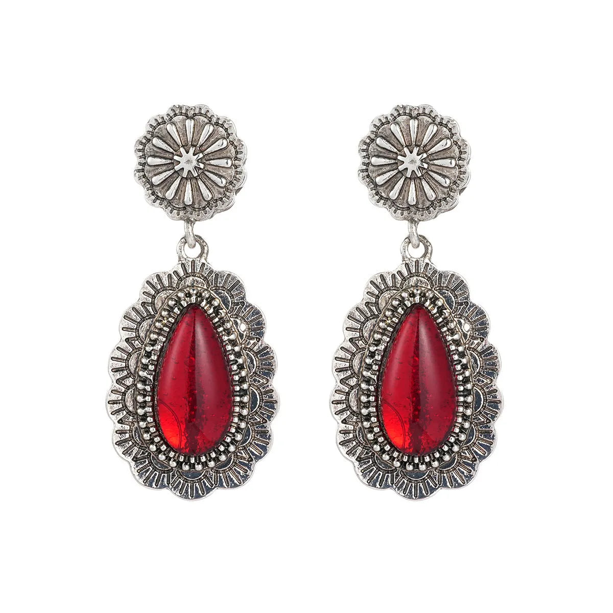 Pair of retro Bohemian carved drop earrings in red alloy for women, shown as a single pair