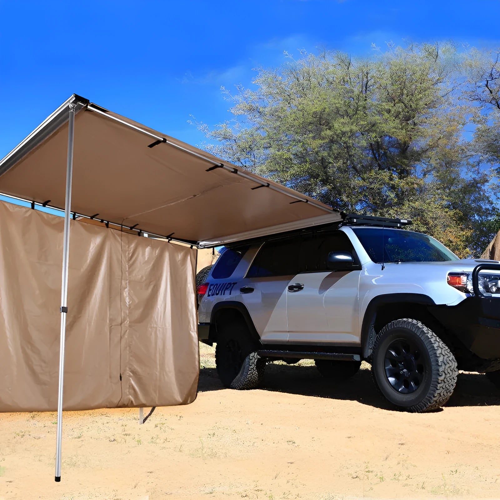 Black glue coated car sunshade tent with aluminium poles set up outdoors.