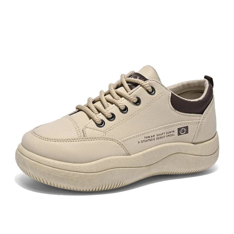 Women's white Korean-style lace-up pumps with a cross strap detail and a mid heel.