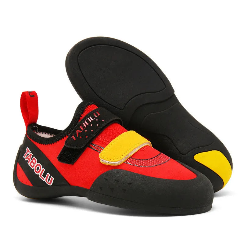Beginner unisex rock climbing shoes with Velcro straps and a coloured rubber sole.