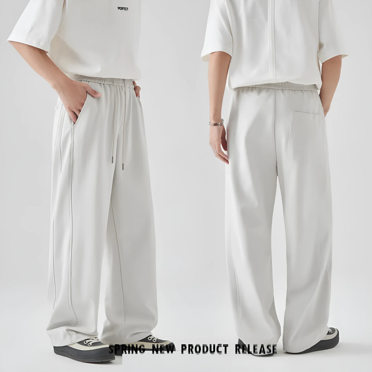Men's grey cotton blend summer casual trousers with a high waist, straight leg, and front lace-up detail.