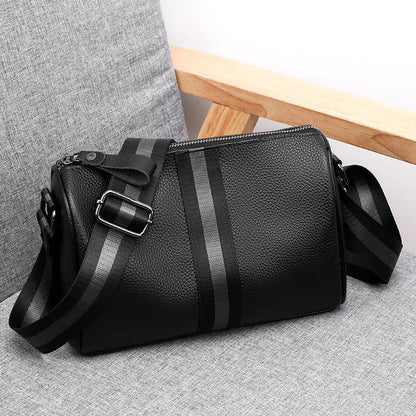 Black genuine leather one-shoulder crossbody bag with dimensions 24cm wide by 16cm high.