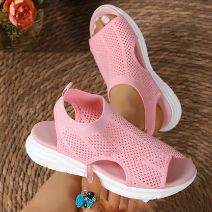 Women's platform sports sandals in black with mesh lining and a flat toe rubber sole.