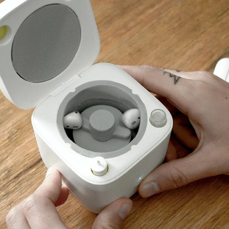 Automated Earbuds Cleaning Tool for AirPods: An innovative device that effortlessly removes dirt and debris from your wireless earbuds