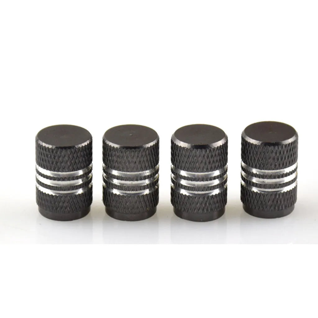 Set of stainless steel car tyre valve caps in multiple colours: black, red, blue, gold, silver, green, purple, sky blue, grey, orange.