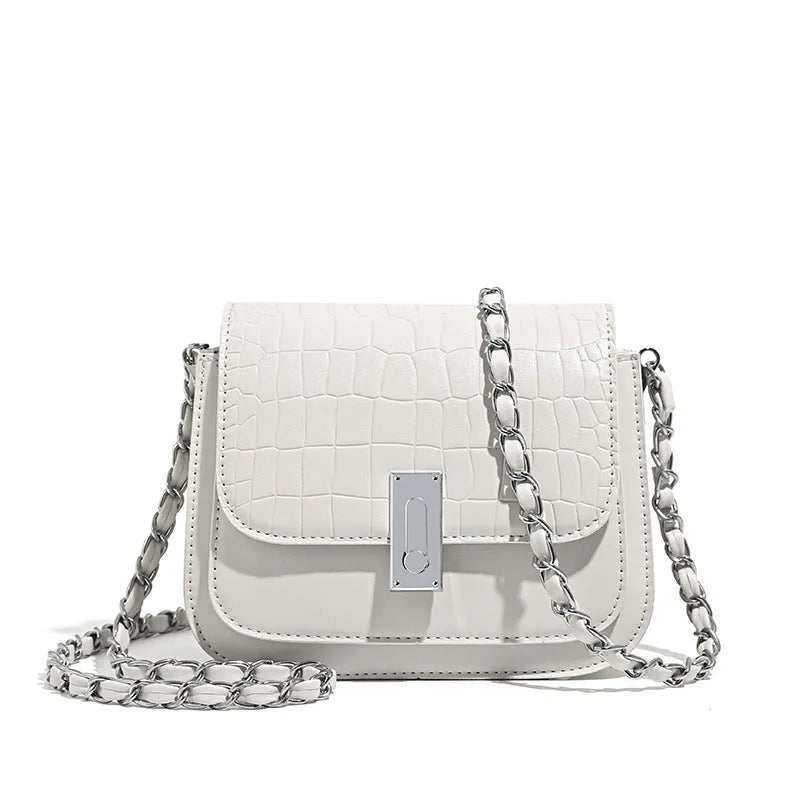 Women's soft PU shoulder bag with chain strap, horizontal square design in black colour showing sandwich pocket