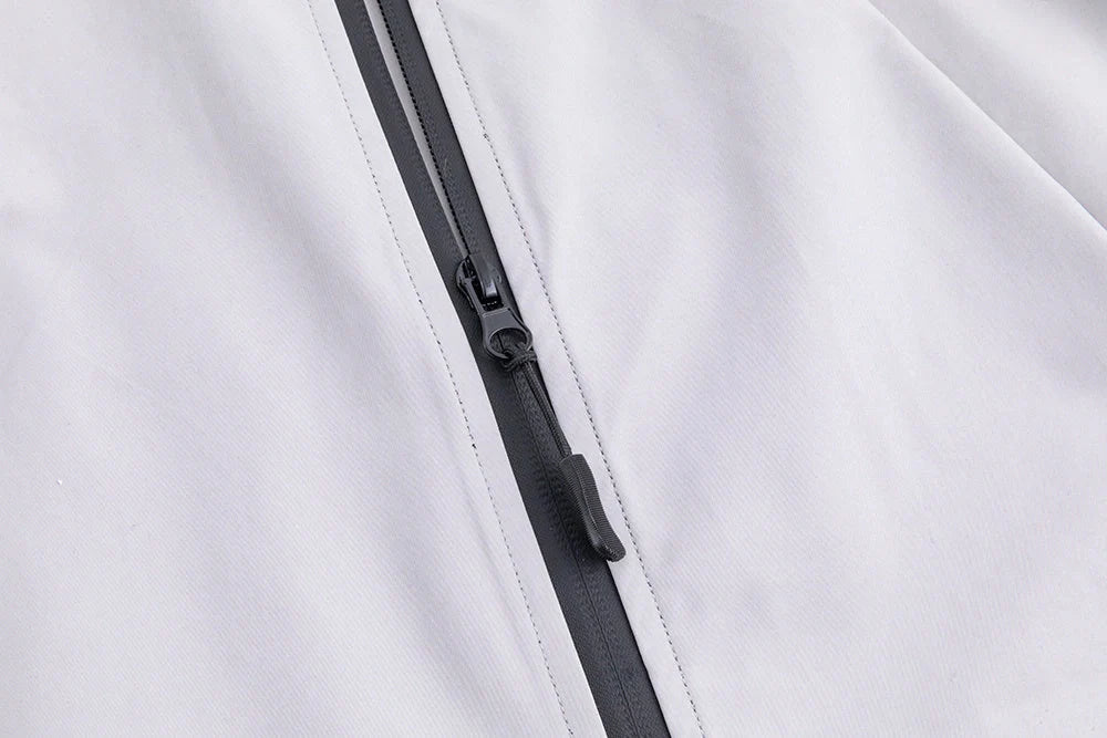 Military Green Assault Suit for outdoor adventures, durable and comfortable with multiple pockets.