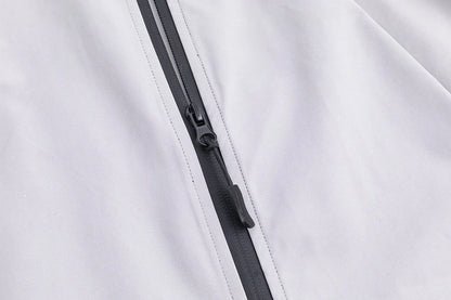 Military Green Assault Suit for outdoor adventures, durable and comfortable with multiple pockets.