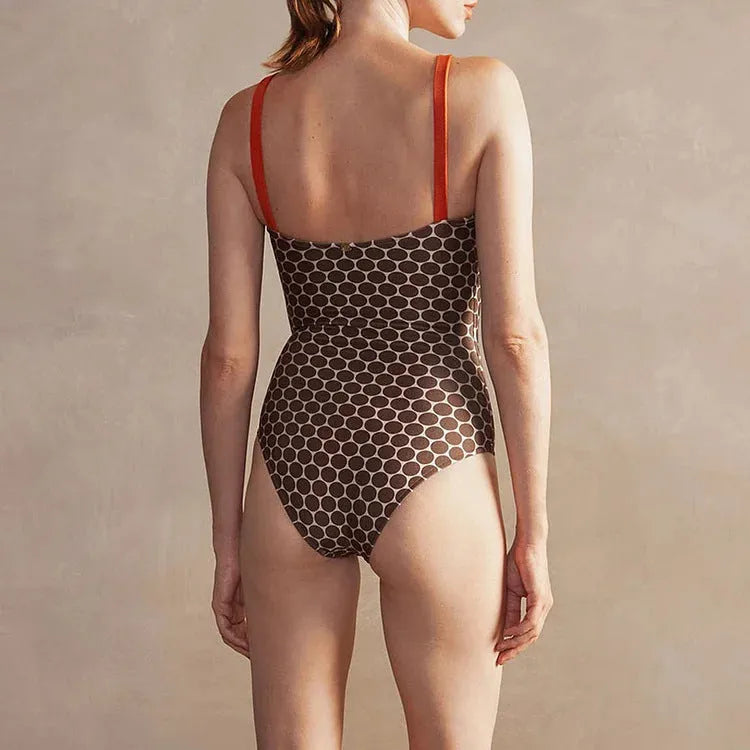 Women's one-piece swimsuit with wrap skirt in dots pattern design