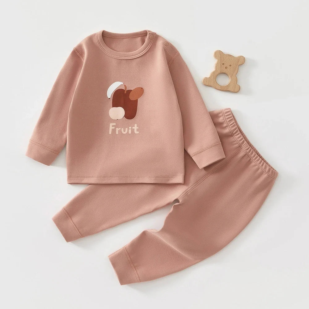 Baby wearing long-sleeved cotton pajamas with cartoon pattern, available in heights 66-120cm