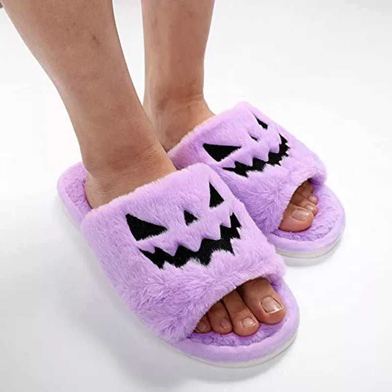 Women's Halloween winter slippers with rabbit fur uppers and PU soles in purple, black, pink, or orange.