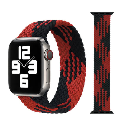 Apple Watch with elastic braided nylon strap in single-loop design showing stretch capability