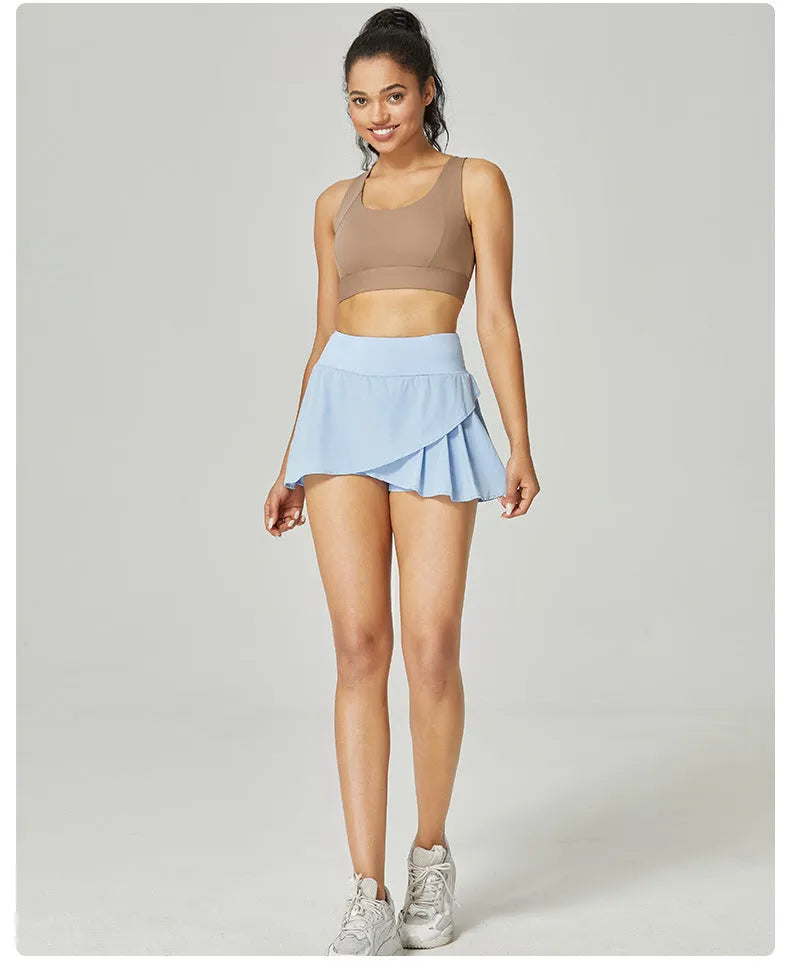 Women's solid colour quick-drying sports shorts in nylon and spandex for running and gym.