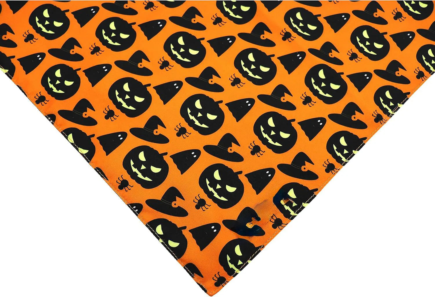 Black and orange reversible Halloween dog bandana with pumpkin and spider web print laid flat