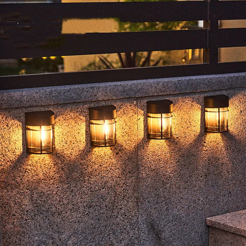 Solar outdoor wall light with AA NiMH battery and monocrystalline silicon panel for patio balcony garden illumination with IP65 waterproof rating and 8-10 hour operation from 6-8 hour solar charge in warm light colour