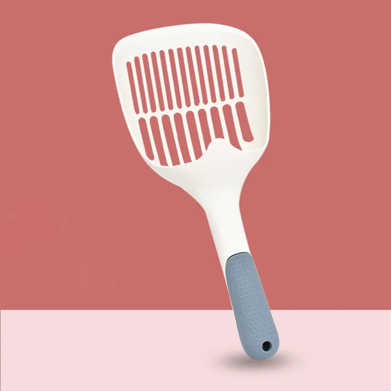White cat litter shovel with blue detailing, showing large scoop head for pet waste removal
