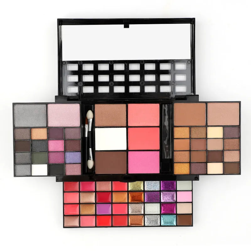 74 colour makeup palette open to show eyeshadows, lip glosses, and face powders with included brushes