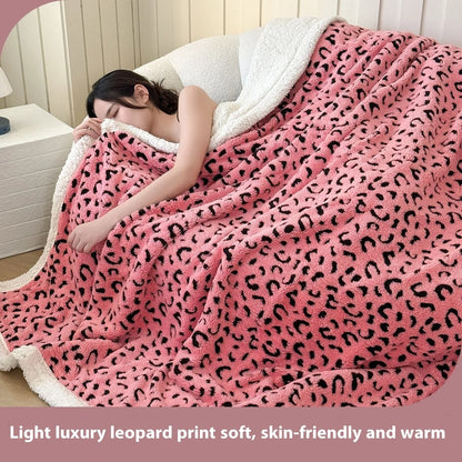 Double-layer cationic leopard jacquard taffeta blanket showing raised animal print pattern in available colour options
