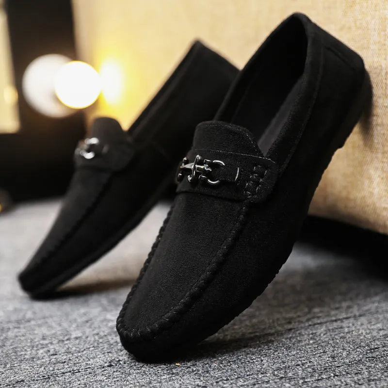 Men's black waterproof slip-on loafers with round toe and low stiletto heel on a rubber sole