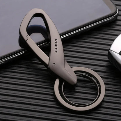 Zinc alloy double ring key chain measuring 8.3x3.5cm with black finish and modern simplicity design