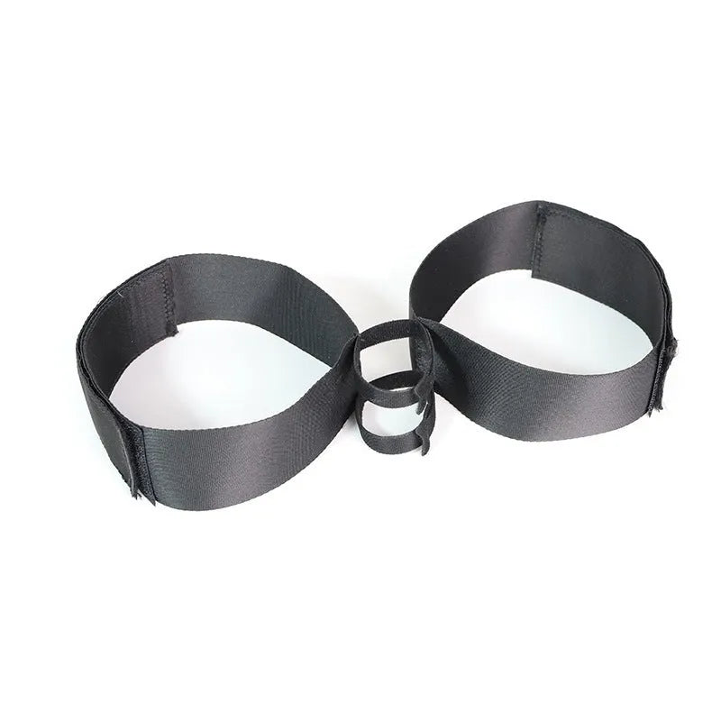 Black knitted appliance strap for toy tools, showing adjustable design and knitted belt construction
