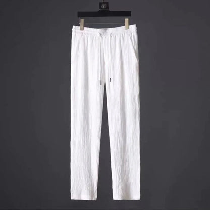Men's summer leisure suit with loose-fit short sleeve top and drawstring trousers