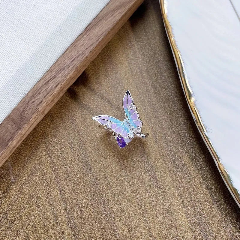 Adjustable copper insect ring with dripping oil finish showing detailed modelling and adjustable opening mechanism