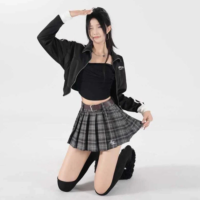 High-waisted cotton A-line skirt with pleated design in black plaid pattern, showing spandex blend stretch and A-line silhouette