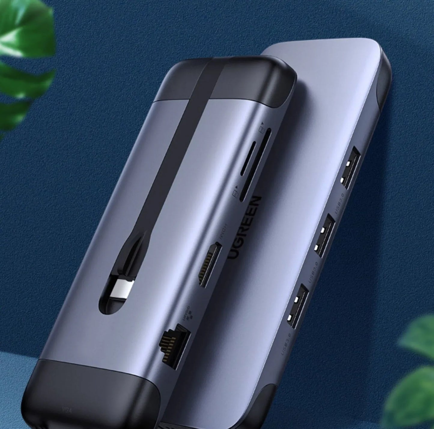 Dock expansion USB adapter converter with HDMI, PD charging, and USB 3.0 ports on a desk