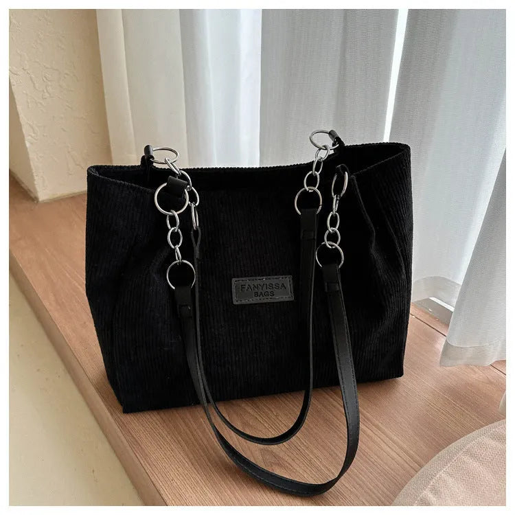 Corduroy one-shoulder tote handbag in horizontal square shape with three-dimensional pocket