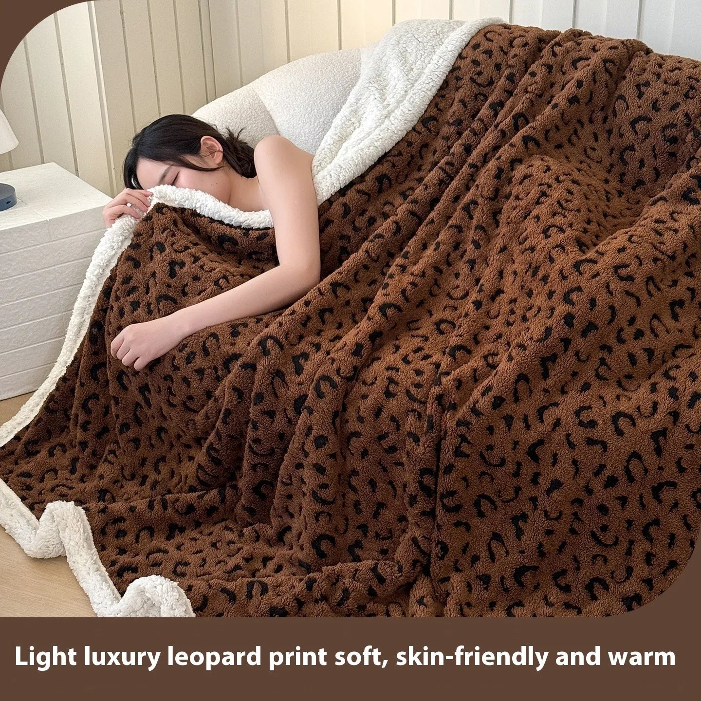 Double-layer cationic leopard jacquard taffeta blanket showing raised animal print pattern in available colour options