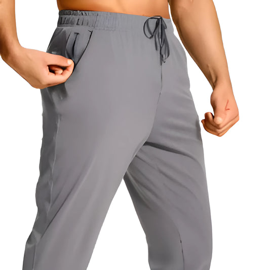 Men's loose casual trousers in solid colour, available in sizes XS to 4XL, made from 100% polyester fabric