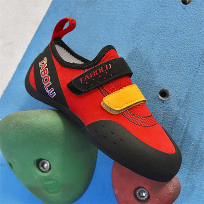 Beginner unisex rock climbing shoes with Velcro straps and a coloured rubber sole.