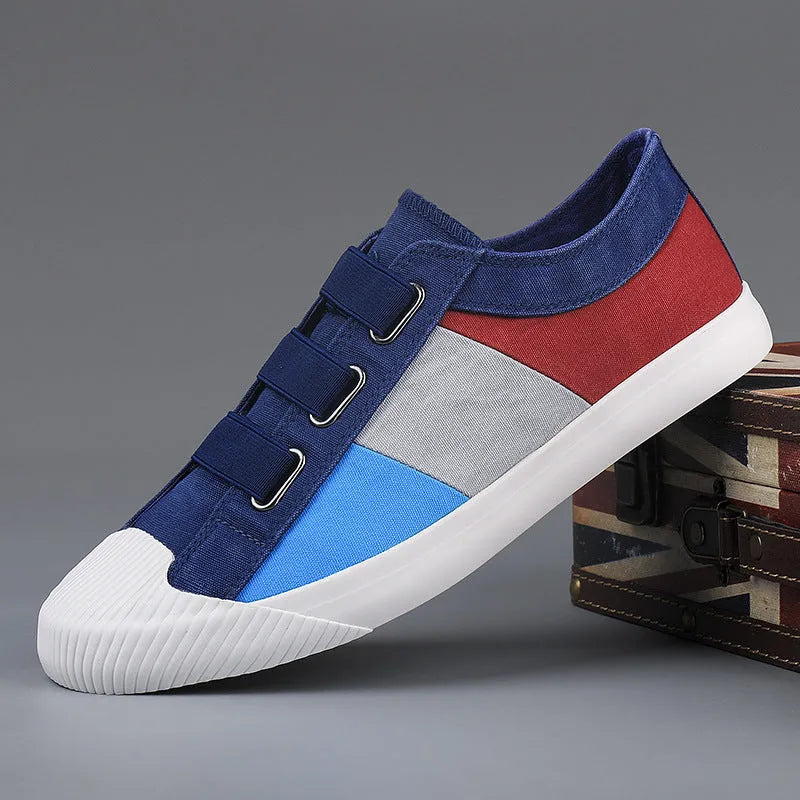Men's canvas casual sneakers with elastic band fastening and vulcanised rubber sole in multiple colour options
