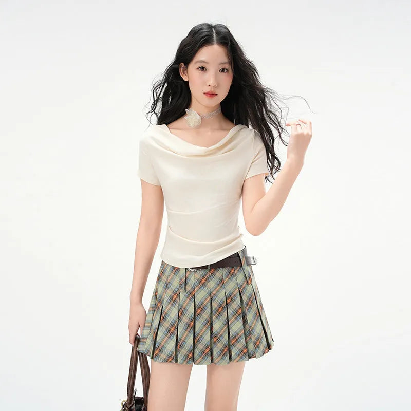 Women's one-shoulder draped neckline short sleeve top in slim fit with pleat detail, shown in Apricot