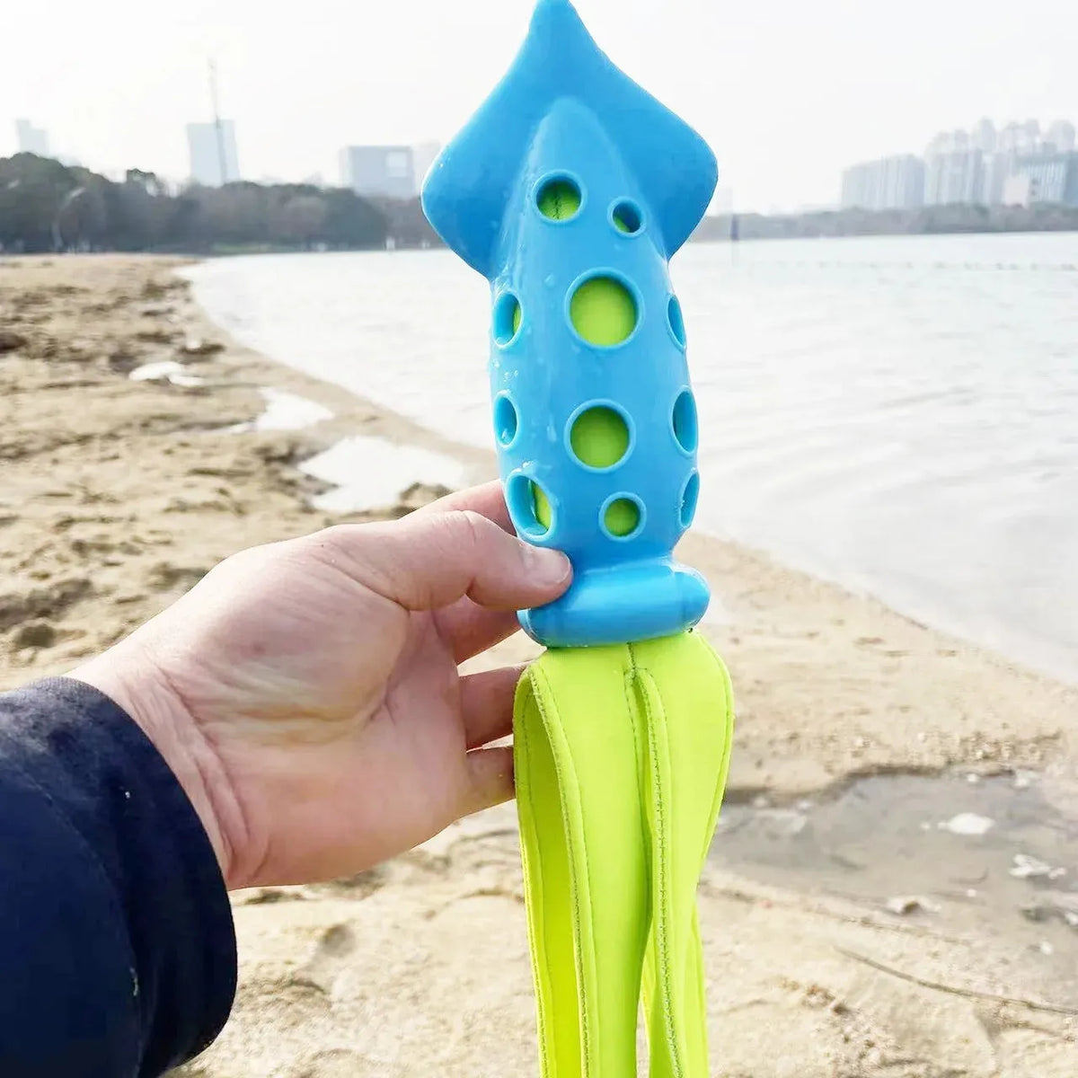 Blue cuttlefish-shaped dog chew toy with squeaker measuring approximately 39 cm