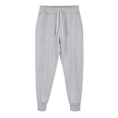 Men's casual trousers with drawstring ankle ties in polyester cotton fabric