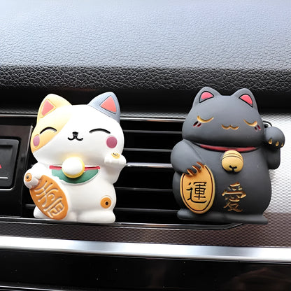 Resin cat-shaped car vent clip holding aromatherapy cotton for vehicle odour control