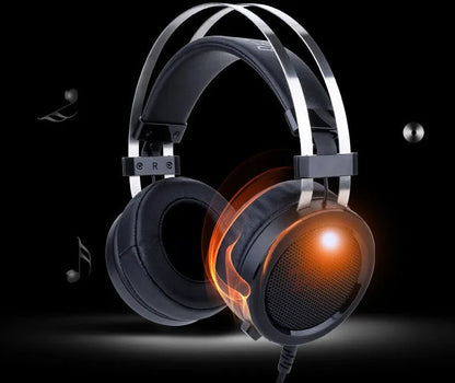 Black wired PC gaming headset with over-ear cups and a 3.5mm audio jack.