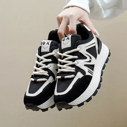 Women's solid colour platform sports casual shoes with flat heel and front lace-up.