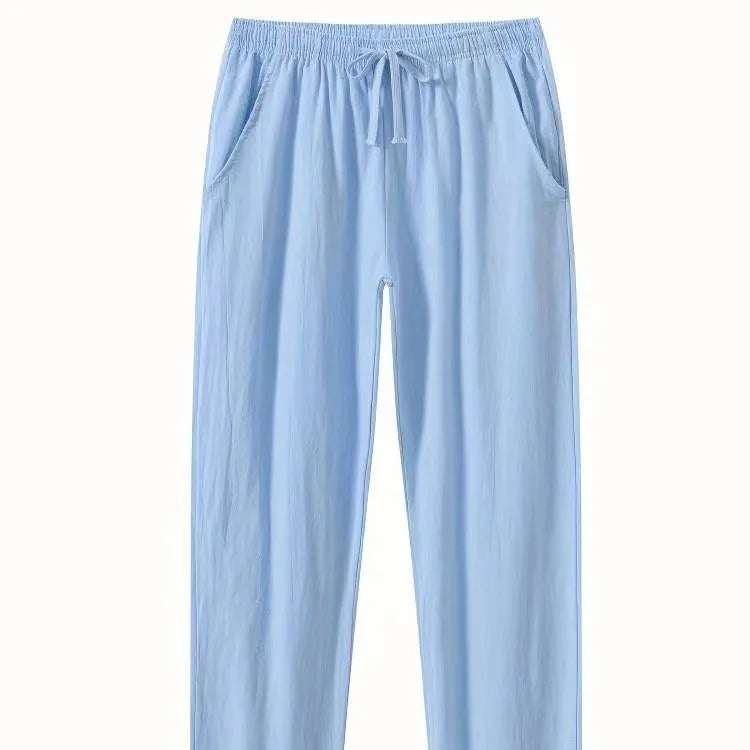 Men's cotton linen beach trousers in loose casual fit, shown in solid colour options