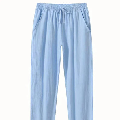 Men's cotton linen beach trousers in loose casual fit, shown in solid colour options