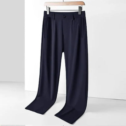 Men's black Ice Silk straight leg leisure trousers with elastic waistband laid flat