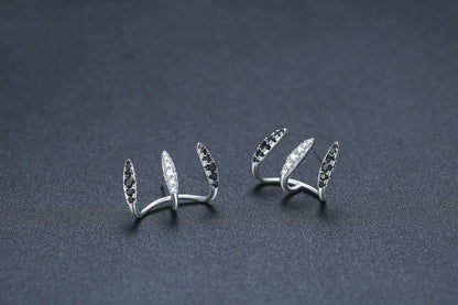 Elegant copper three-claw zircon earrings for women with geometric design