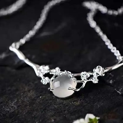 White gold colour copper necklace with moonlight white chalcedony inlay, cross chain, and moon shadow cold plum design