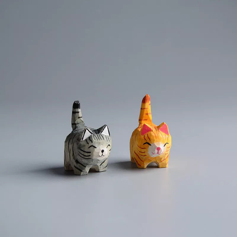 Handmade wooden cat trinkets in gray and orange, perfect for decor or gifts