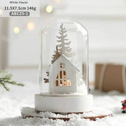 Small 15 cm glass reindeer night lamp in white snowman cabin style casting 100 lumen festive glow on table