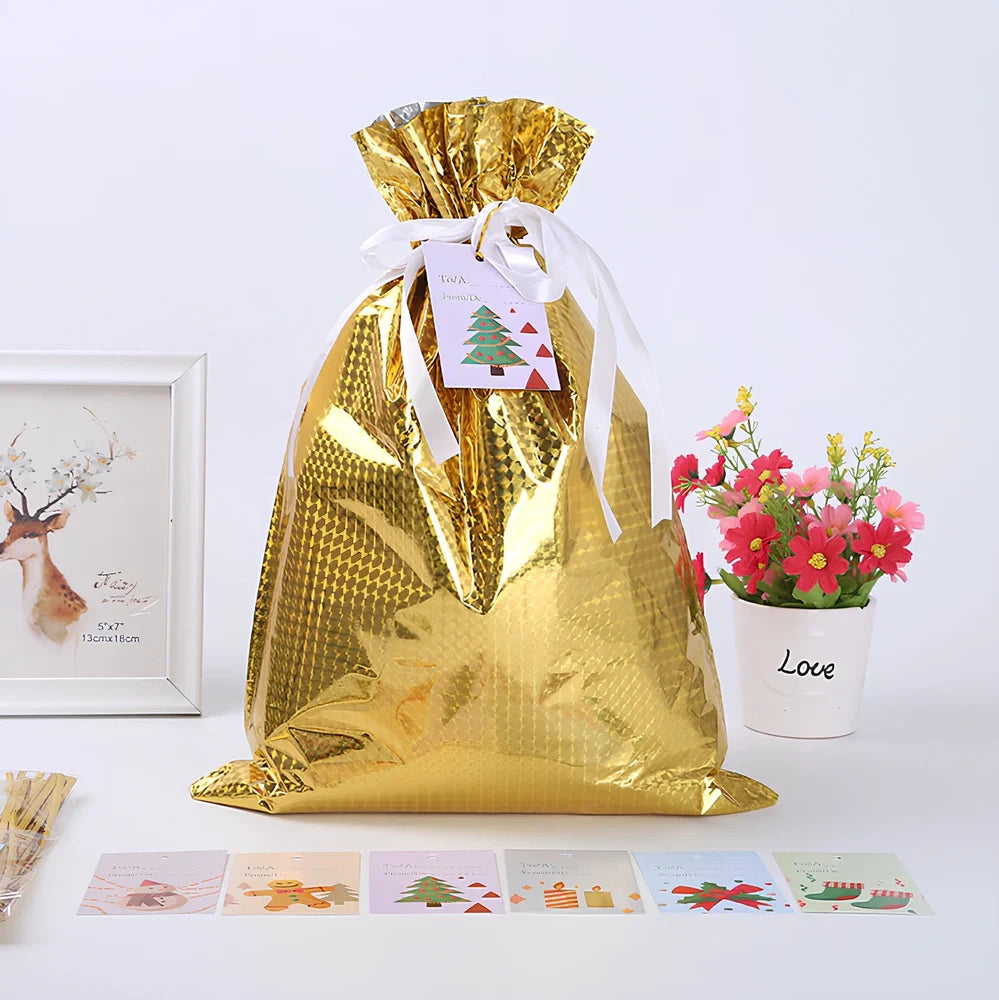 Christmas gift bag with drawstring closure in laser gold finish, 32x24cm dimensions